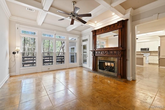 unfurnished living room with baseboards, coffered ceiling, crown molding, a fireplace, and beam ceiling