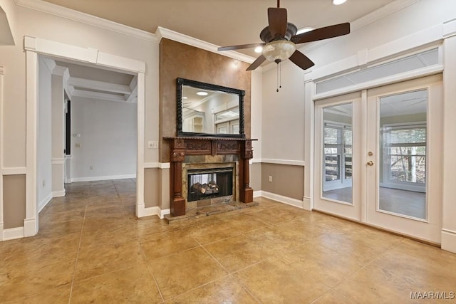 unfurnished living room with french doors, light tile patterned floors, ornamental molding, a multi sided fireplace, and baseboards