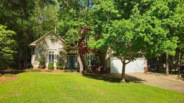 view of front of house with a front yard and aphalt driveway