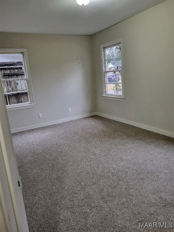 view of carpeted spare room