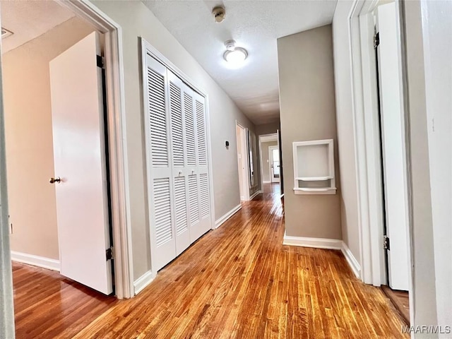 hall featuring light hardwood / wood-style flooring