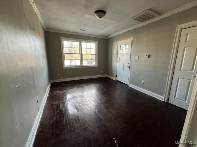 interior space featuring dark hardwood / wood-style flooring and ornamental molding