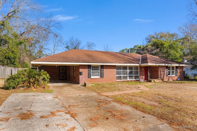 single story home with a carport