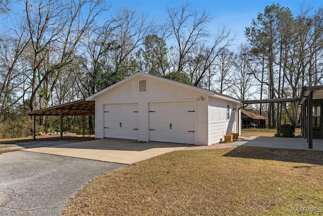 garage with a yard