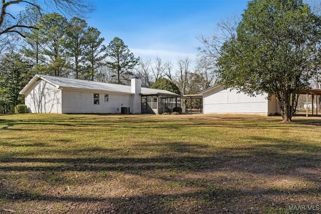 view of yard featuring a carport and cooling unit