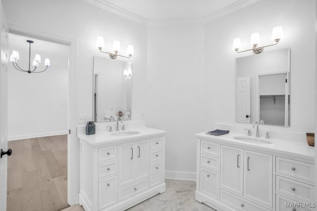 bathroom with vanity and crown molding