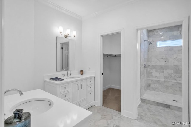 bathroom featuring vanity, ornamental molding, and a tile shower