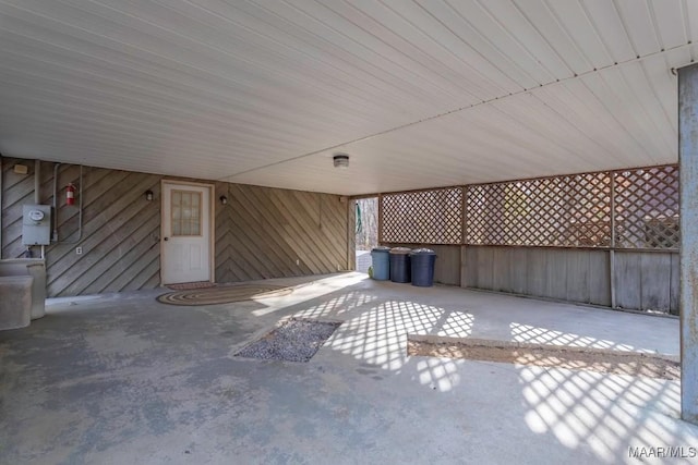 view of patio / terrace featuring a carport