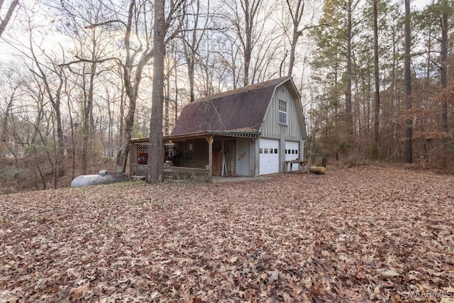 view of outbuilding with a porch