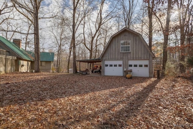 garage featuring a carport