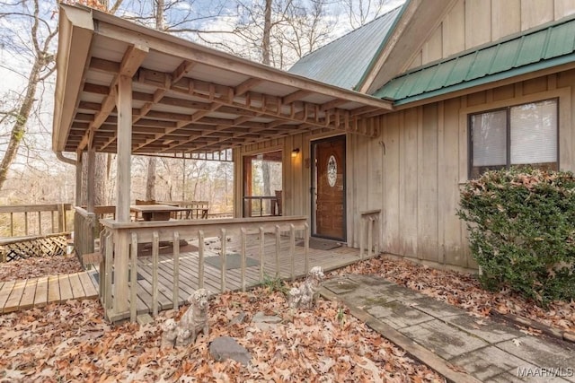 doorway to property featuring a deck