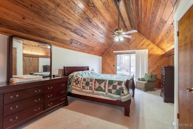 bedroom with wood walls, lofted ceiling, ceiling fan, light carpet, and wooden ceiling