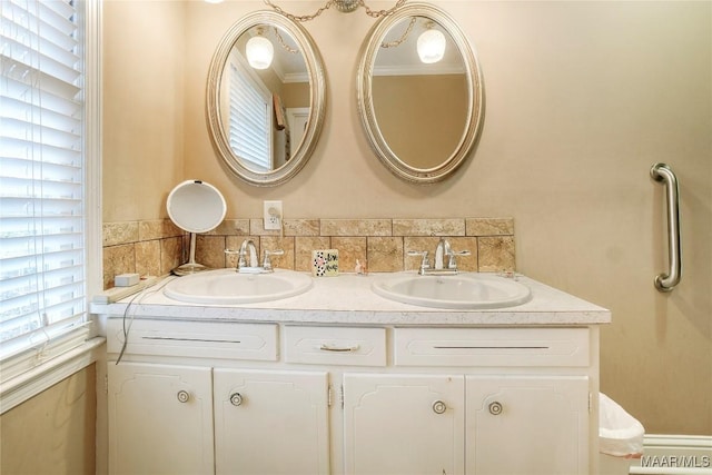 bathroom with vanity and a wealth of natural light