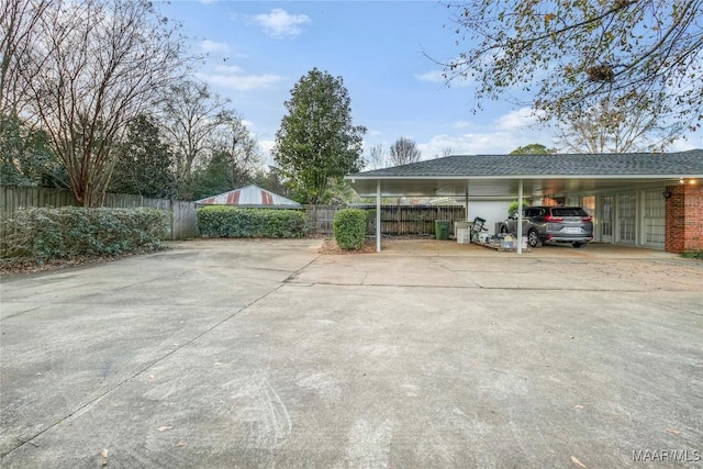 view of car parking featuring a carport