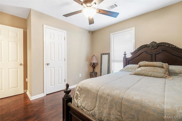 bedroom featuring dark wood-type flooring and ceiling fan