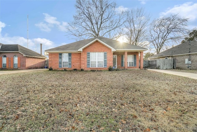 ranch-style house with a front yard