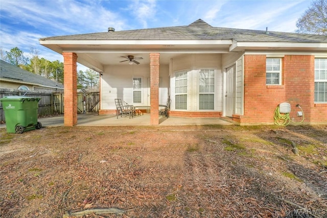 back of property with a patio and ceiling fan