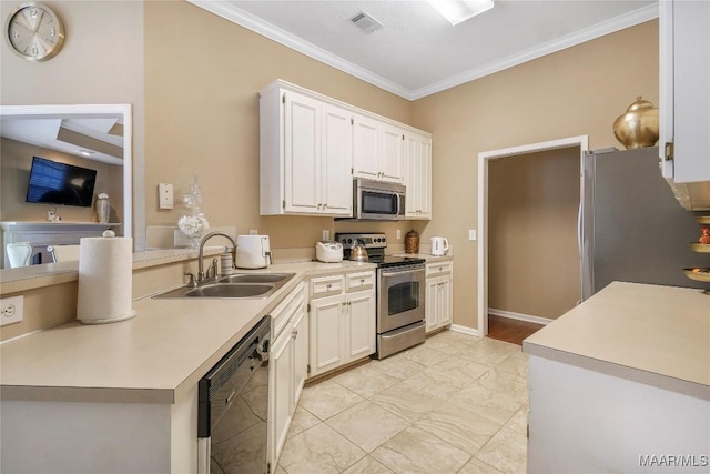 kitchen featuring sink, ornamental molding, white cabinets, and appliances with stainless steel finishes