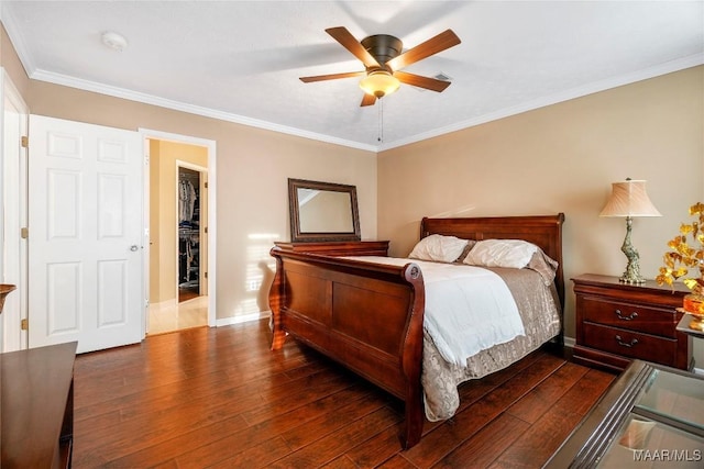 bedroom with ceiling fan, ornamental molding, and dark hardwood / wood-style flooring