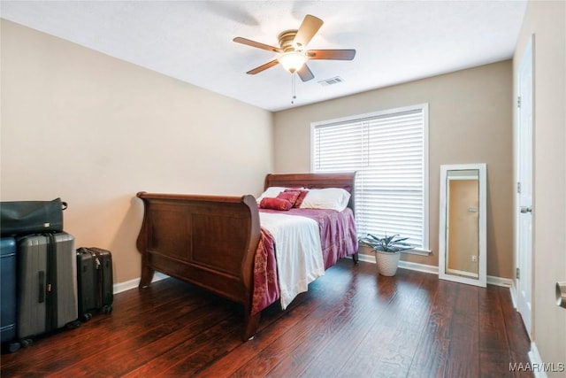 bedroom featuring dark hardwood / wood-style floors and ceiling fan