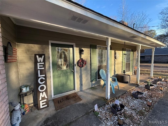 entrance to property with a porch