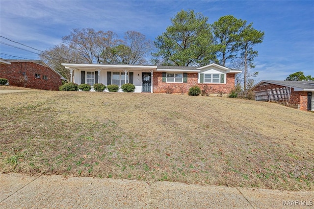 single story home with a front yard