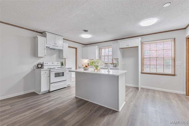 kitchen featuring crown molding, a center island, white cabinets, and white range with electric stovetop