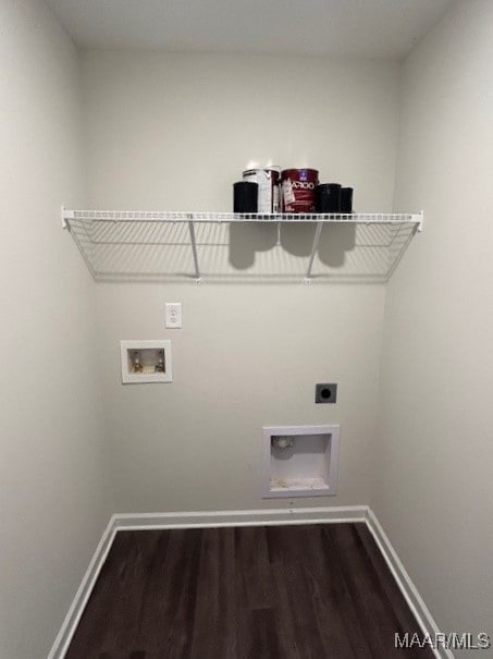 laundry room featuring washer hookup, dark hardwood / wood-style flooring, and electric dryer hookup