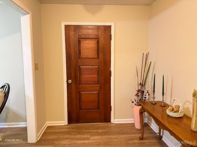 interior space with hardwood / wood-style floors