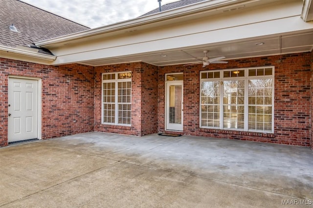 view of patio featuring ceiling fan