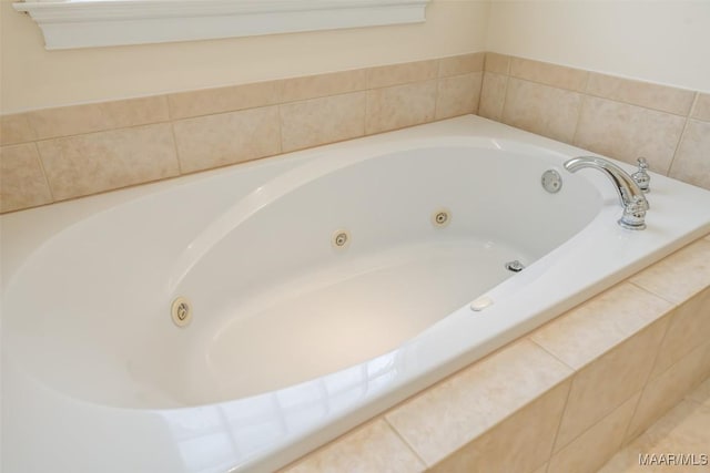 bathroom featuring tiled bath