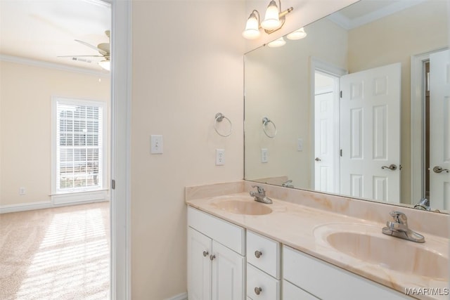 bathroom featuring vanity, ornamental molding, and ceiling fan