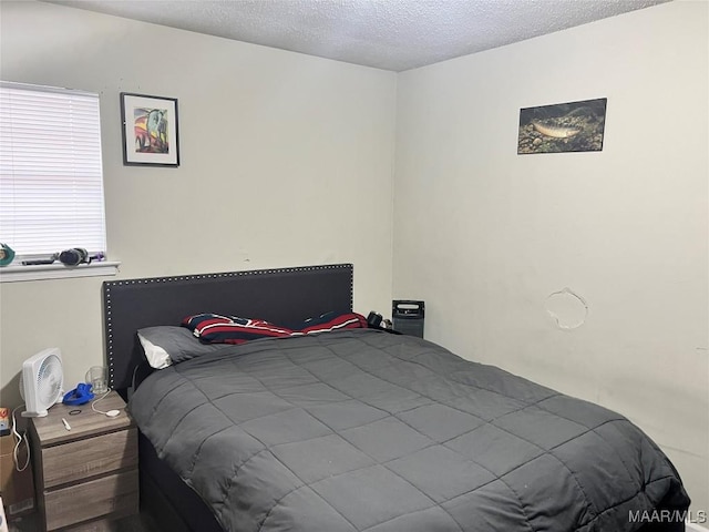 bedroom with a textured ceiling