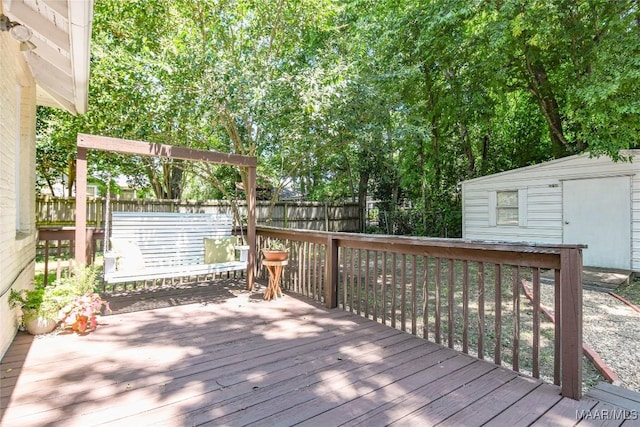 deck featuring a storage unit