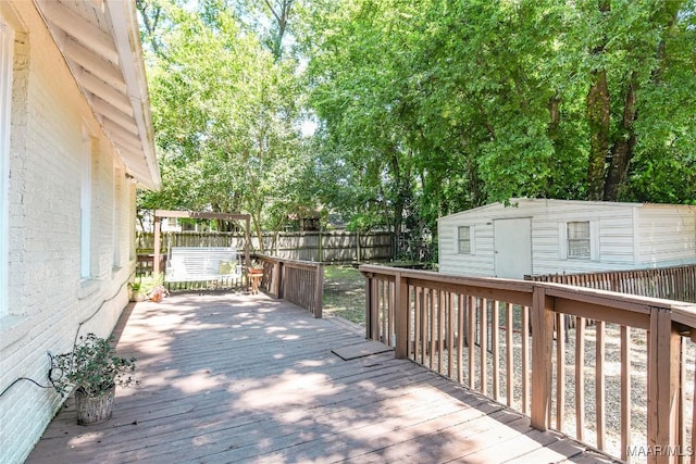 deck with a storage shed