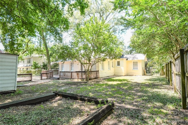 view of yard featuring a deck