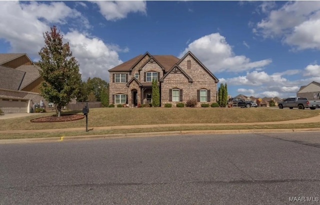 view of front of house featuring a front lawn