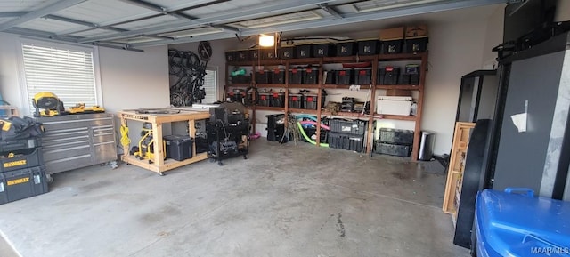 garage with a workshop area