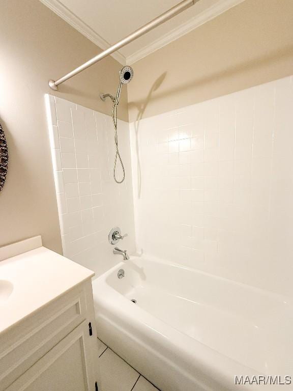 bathroom with crown molding, vanity, and bathing tub / shower combination