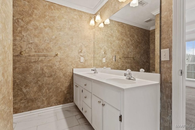 bathroom featuring ornamental molding and vanity