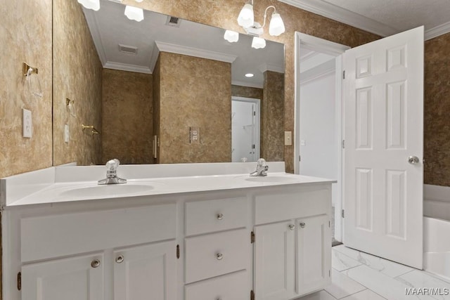 bathroom featuring ornamental molding and vanity