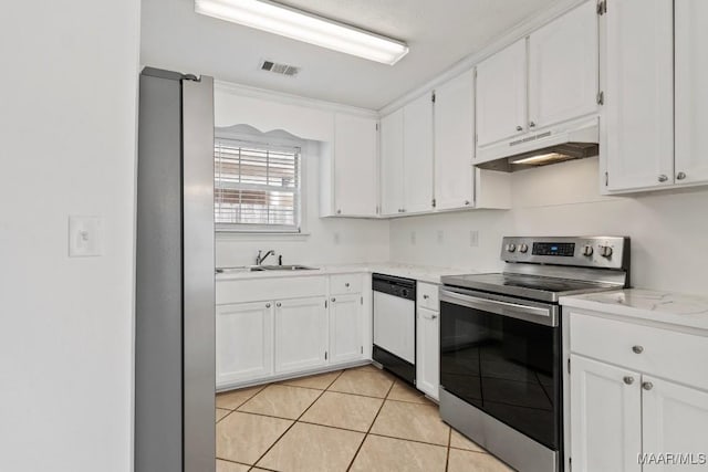 kitchen with appliances with stainless steel finishes, sink, and white cabinets