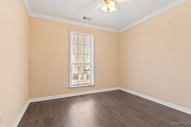 spare room with crown molding, dark wood-type flooring, and ceiling fan