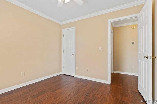 unfurnished bedroom featuring ornamental molding, ceiling fan, and dark hardwood / wood-style flooring