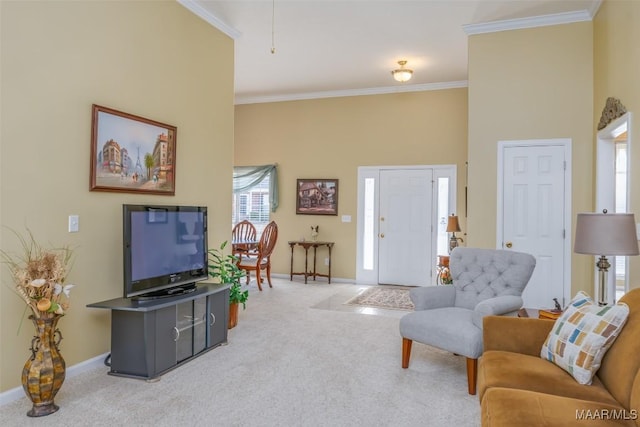 carpeted living room with crown molding, plenty of natural light, and a towering ceiling