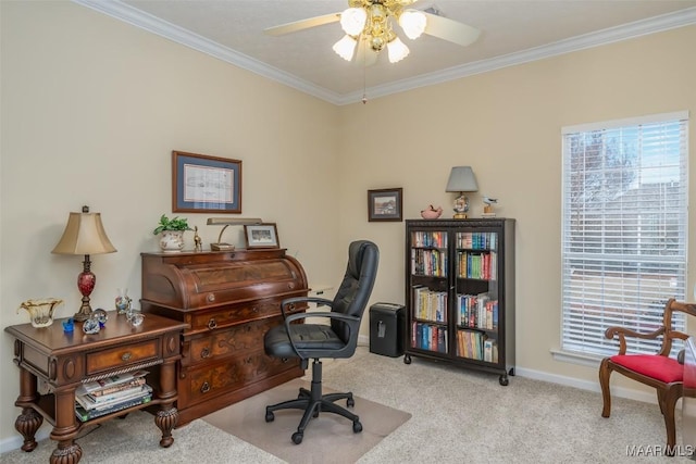 office area featuring light carpet, ceiling fan, ornamental molding, and a healthy amount of sunlight