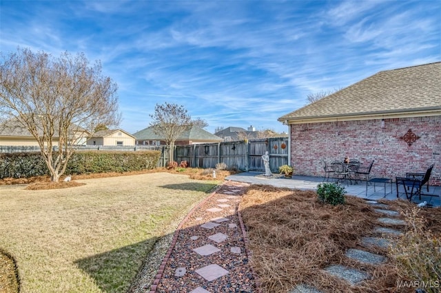 view of yard with a patio area