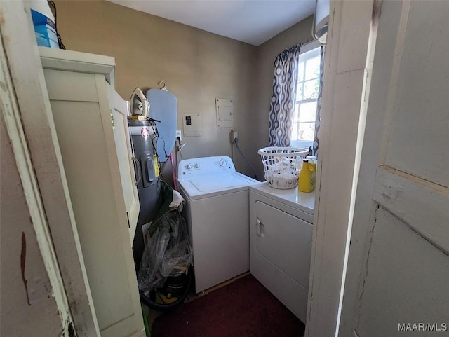 clothes washing area featuring independent washer and dryer