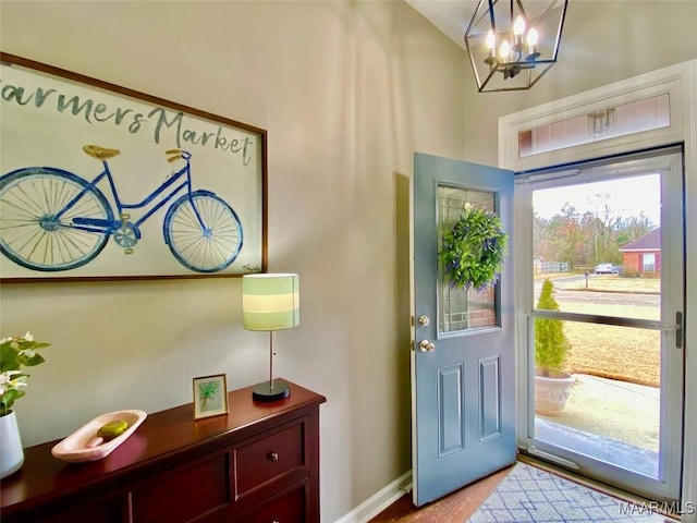 entrance foyer with an inviting chandelier