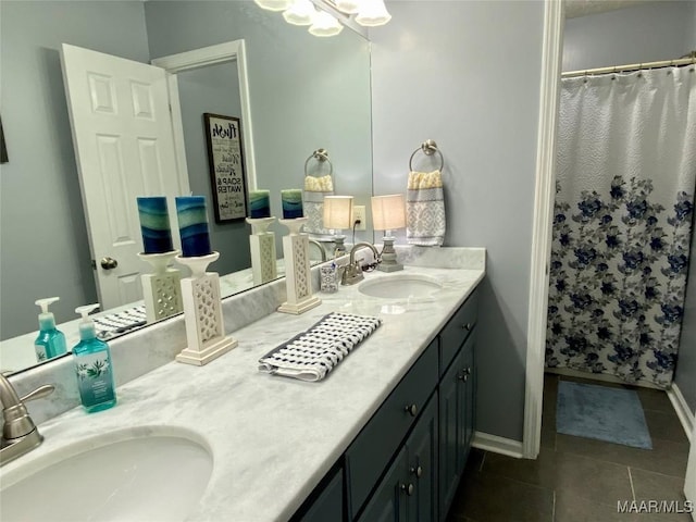 bathroom with tile patterned floors, vanity, and a shower with shower curtain